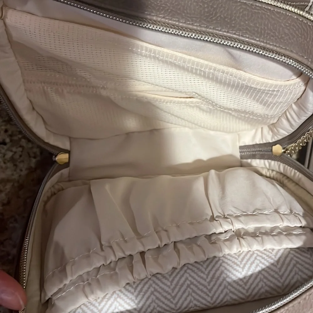 Itzy Ritzy Quilted Crossbody Baby Bag in Taupe